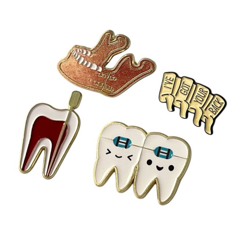 Pin dorado dental 